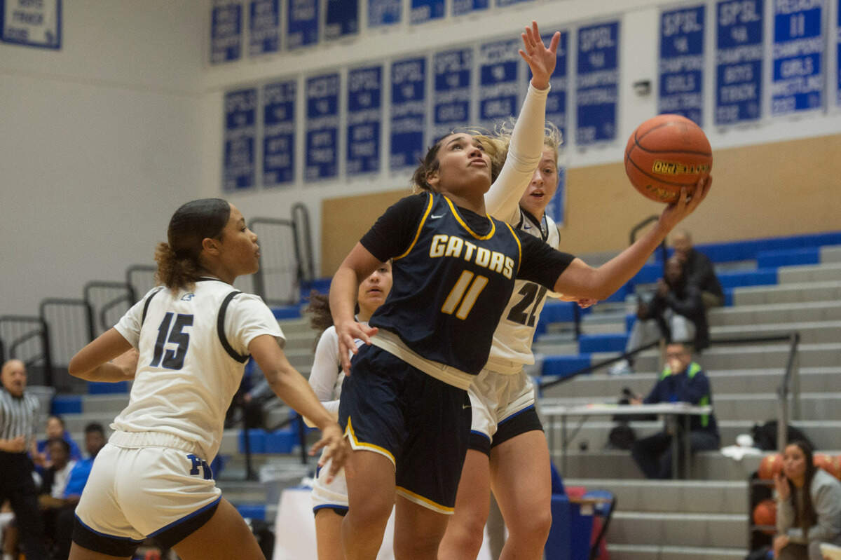 Annie Wright guard Aaliyeh Martin (11) puts up a shot in a game against Federal Way on Monday, Jan. 15, 2024 at Federal Way High School in Federal Way, Wash.