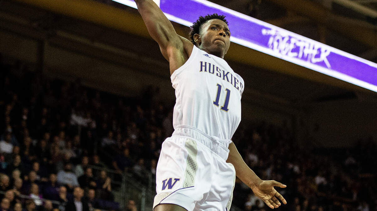 Washington Huskies guard Nahziah Carter (11) goes up for a one-handed dunk during the second half. The Washington Huskies played Mount St. Mary’s in a NCAA basketball game at Her Edmundson Pavilion in Seattle, Wash., on Tuesday, Nov. 12, 2019.