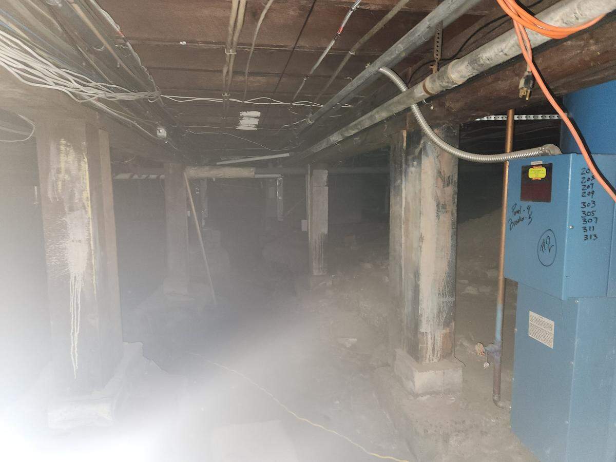 A dirt room next to Manresa Castle’s basement “dungeon” is shown early morning on July 2, 2023, in Port Townsend. Hotel employee Amberdawn Bolding, who won’t enter this room by herself, said a maintenance worker reports hearing voices while working in this area.