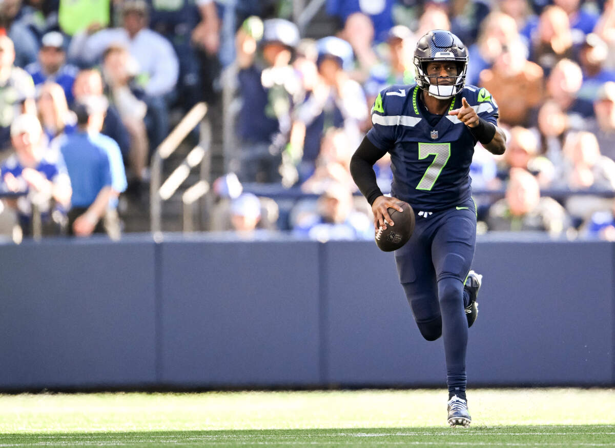 Seattle Seahawks quarterback Geno Smith (7) picks up big yards on the ground during the third quarter of the game against the New York Giants at Lumen Field, on Sunday, Oct. 6, 2024 in Seattle, Wash.