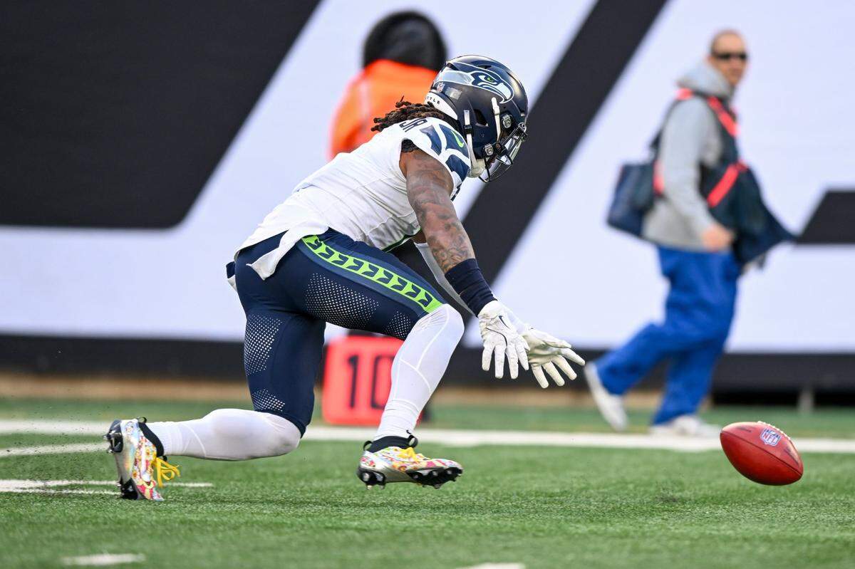 Seattle Seahawks wide receiver Laviska Shenault Jr. (1) drops the ball on a kickoff during the second quarter against the New York Jets at MetLife Stadium. Mandatory Credit: Mark Smith-Imagn Images
