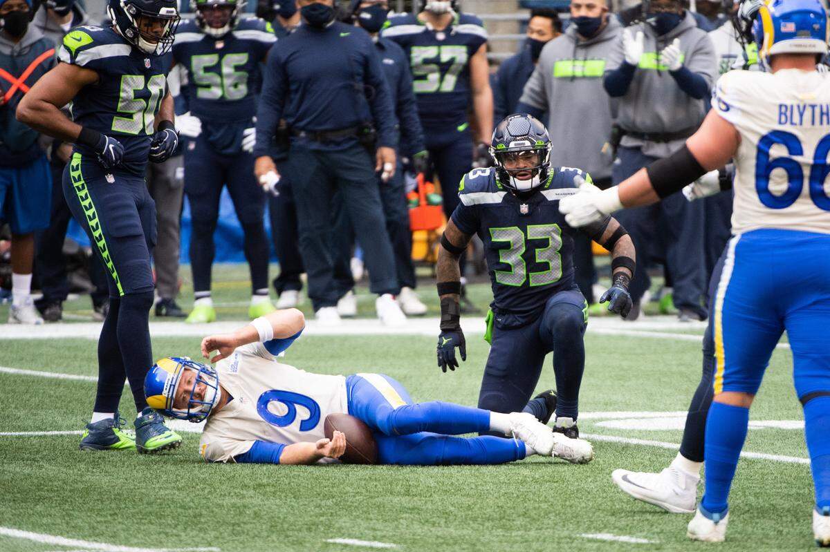 Los Angeles Rams quarterback John Wolford is injured after a hit by Seattle Seahawks defensive back Jamal Adams The Seattle Seahawks played the Los Angeles Rams in a NFL wildcard playoff game at Lumen Field in Seattle, Wash., on Saturday, Jan. 9, 2021.
