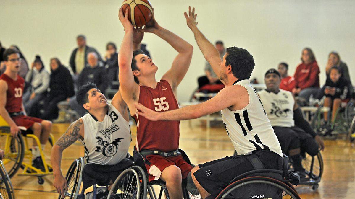 Players compete in a Metro Parks Tacoma adaptive basketball tournament.
