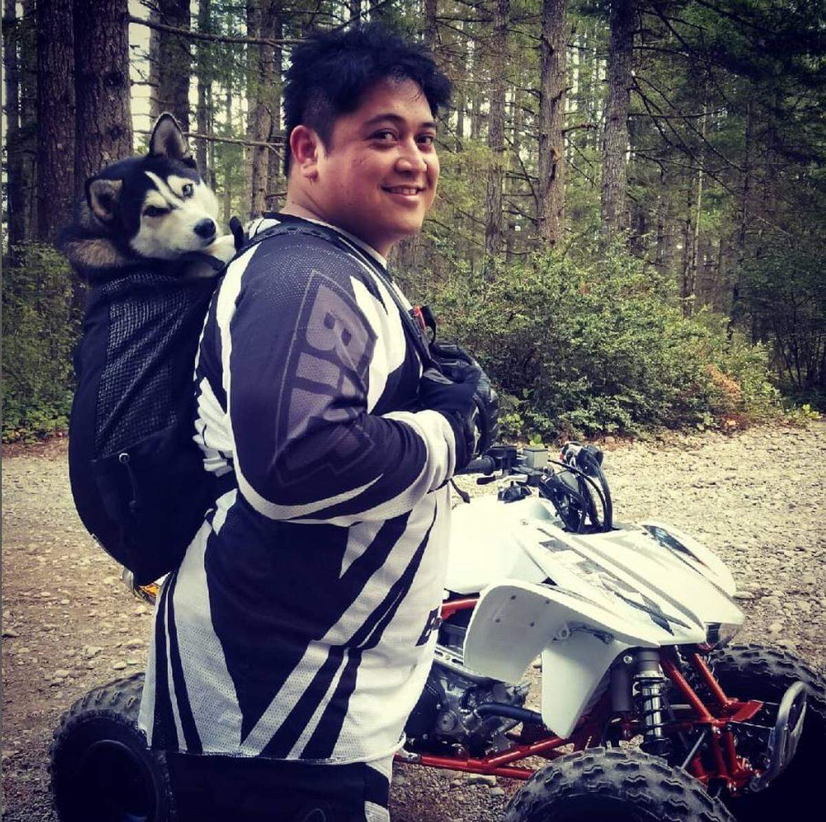 Thomas Lorezca of Kent is pictured in a photograph taken in 2021 with his miniature husky, Alpine. Lorezca was murdered on the job in a fatal shooting on May 23, 2022.