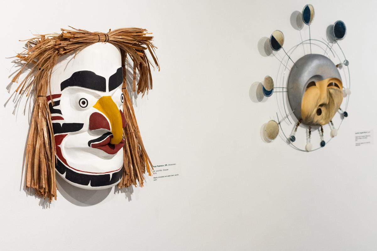 “Mr. and Mrs. Grouse” by Skokomish artist Peter Peterson Sr., left, and “Inigun Rock Formation Patterned by Action of Water on the Shore” by Yup’ik artist Jennifer Angaiak Wood hang from the walls of “The Longhouse at 25: Across the Waters” exhibit. Celebrating the 25th anniversary of the Longhouse Education and Cultural Center, the exhibit is on display until Jan. 29 at the Evergreen Gallery at Evergreen State College in Olympia.