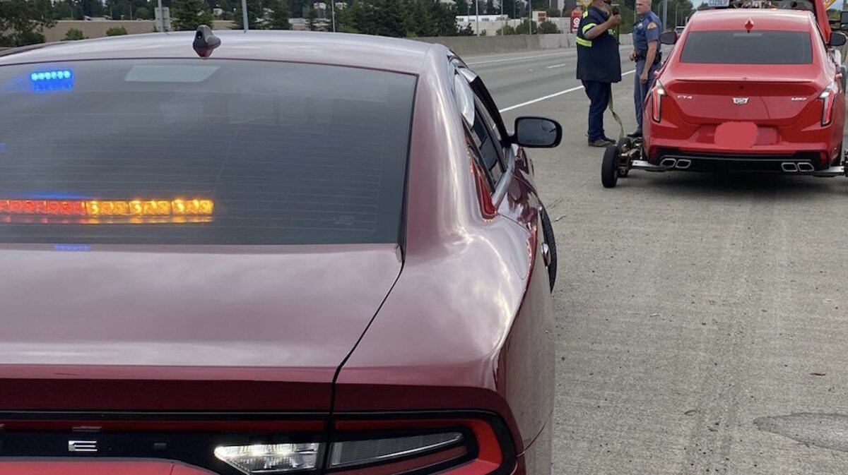 A red Cadillac CT 4 and a black Mitsubishi Lancer were impounded after the two drivers were racing on Tacoma Narrows Bridge Saturday morning.