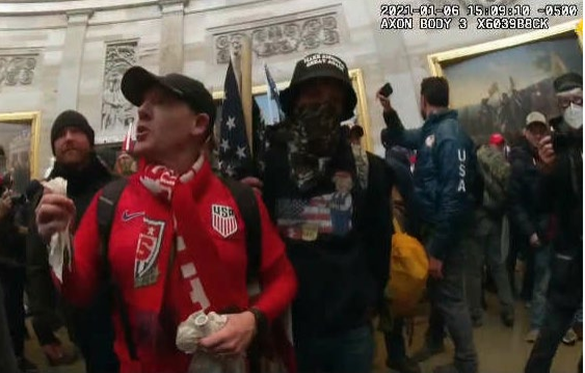 Scott Christensen (left) is seen in the rotunda of the U.S. Capitol on Jan. 6, 2021 in Metropolitan Police Department body camera footage during the attack on the Capitol building, according to a criminal complaint filed in U.S. District Court for the District of Columbia.