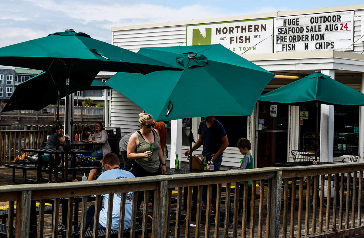 People dine on the outside patio at Northern Fish Co. in Old Town Tacoma Aug. 10, 2019.
