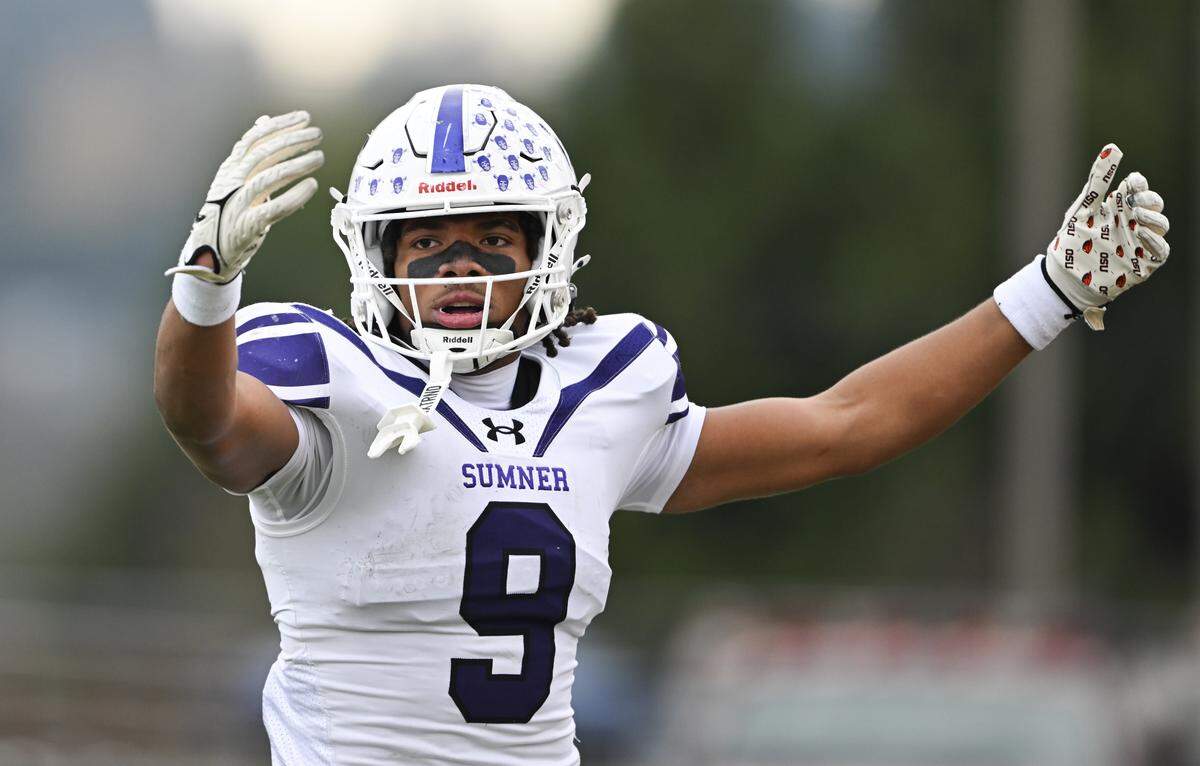 Sumner running back Lance McGee (9) reacts to a rushing touchdown against Puyallup during the first half of the 4A state semifinal game at Sparks Stadium, on Saturday, Nov. 29, 2025 in Puyallup, Wash.