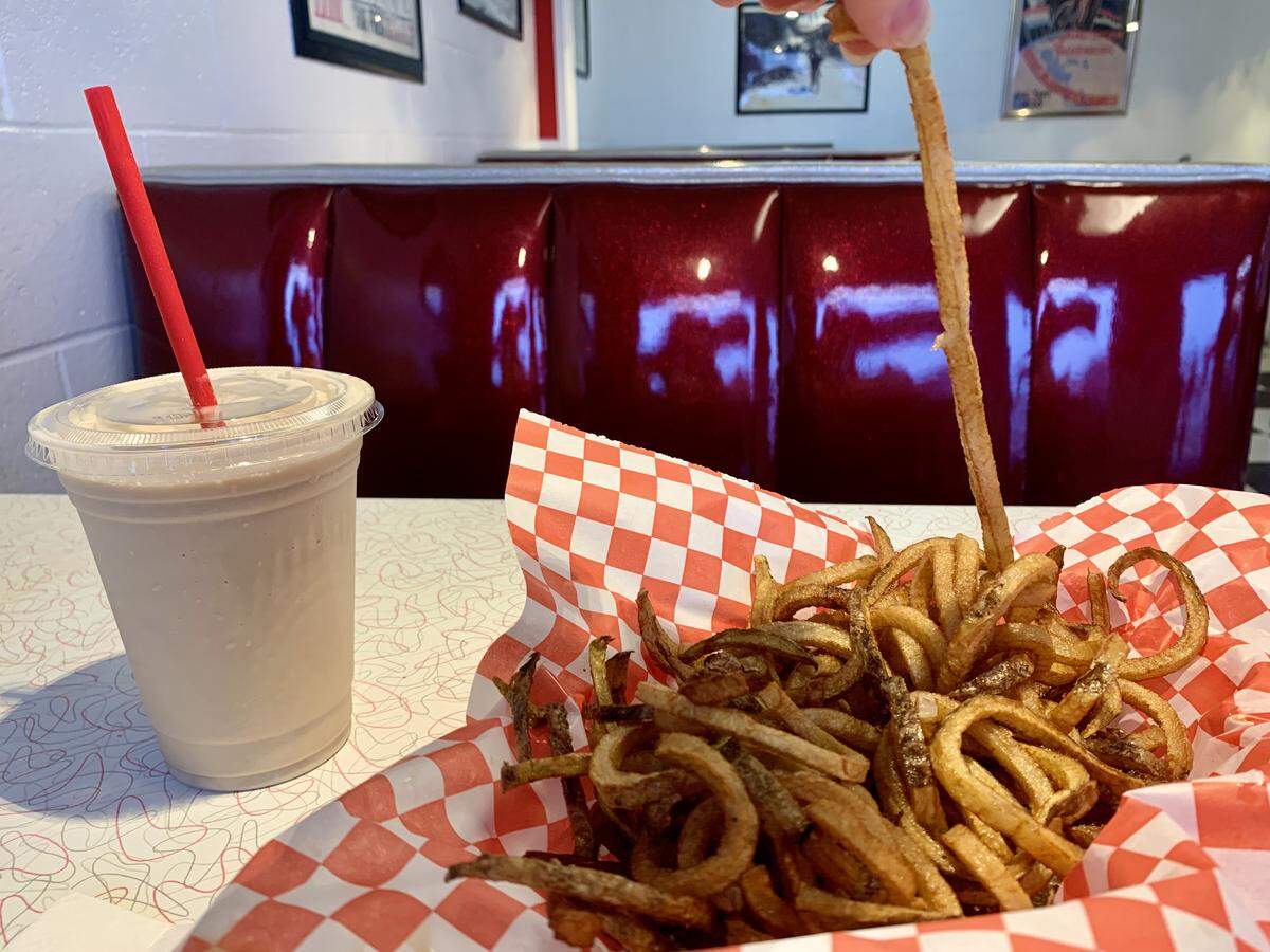 Main Street Dairy Freeze in Sumner offers a cool retro dining room for old-fashioned burgers, a great Vinyl Coffee milkshake and the rare sight of housemade curly fries.