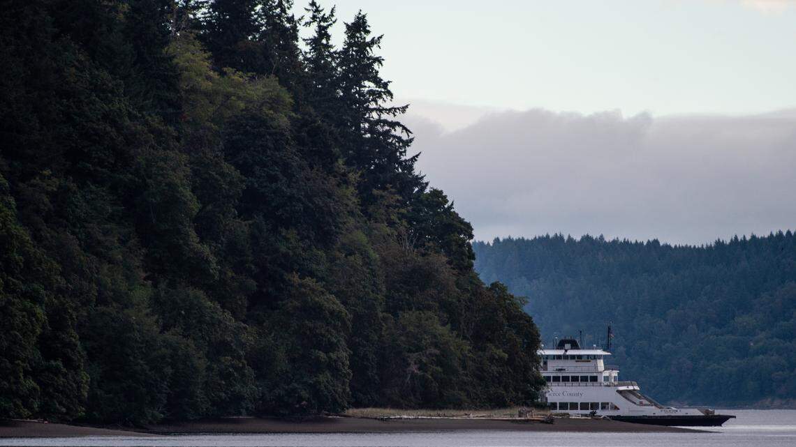The Pierce County ferry makes a stop at Ketron Island to unload emergency personnel Saturday morning. The ferry service has been suspended for all, except for emergency responders and investigators, to Ketron Island until further notice. Ferry service to Anderson Island will operate as close to schedule as possible Saturday, Pierce County officials said. Photographed near Tacoma, Wash., on Saturday, Aug. 11, 2018.