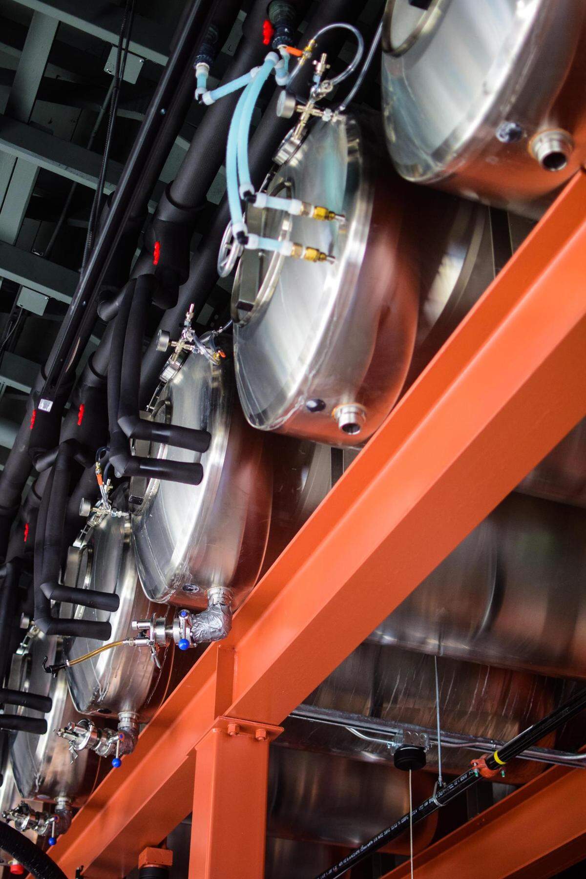 Top Down Brewing in Sumner, Wash., features a unique setup: the serving tanks are hoisted off the floor and above the bar.