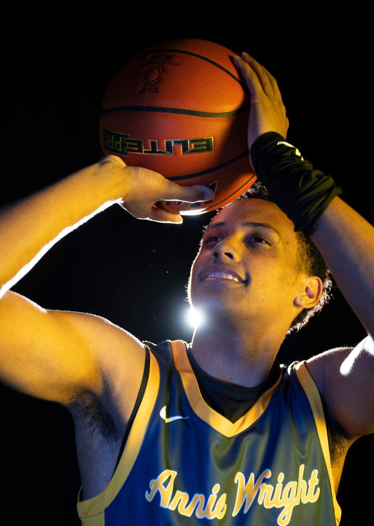 Annie Wright’s Jeremiah Harshman poses for a portrait after being selected as The News Tribune’s 2023 All-Area basketball first team, at Silas High School, on Sunday, March 17, 2024 in Tacoma, Wash.