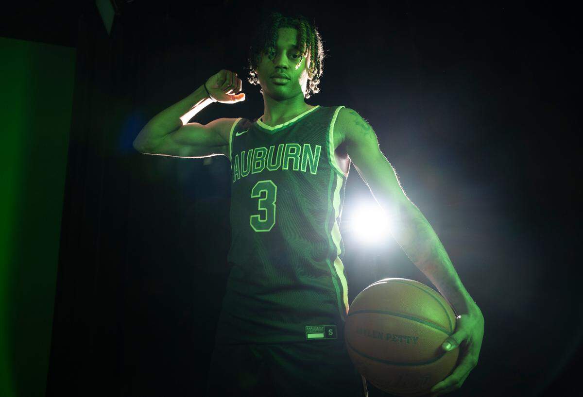 Auburn’s Jaylen Petty poses for a portrait after being selected as The News Tribune’s 2024 All-Area basketball player of the year, at Silas High School, on Sunday, March 17, 2024 in Tacoma, Wash.