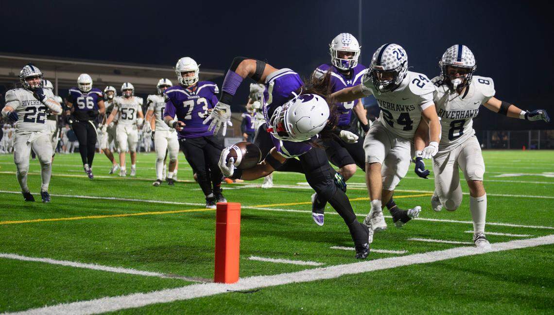 Sumner running back Steele Isaacs flips into the end zone for the game-winning touchdown to complete the comeback victory over the Chiawana Riverhawks, 37-31 in triple overtime of Saturday’s 4A state football semifinal game at Sunset Chev Stadium in Sumner, Washington, on Nov. 30, 2024. Sumner advances to next weekend’s state championship game at Husky Stadium in Seattle.
