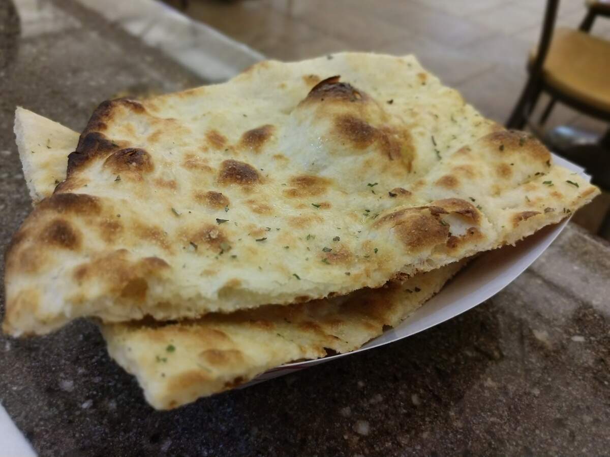 Naan, grilled bread, from Lotus Grill Indian Kitchen from South Hill Mall.