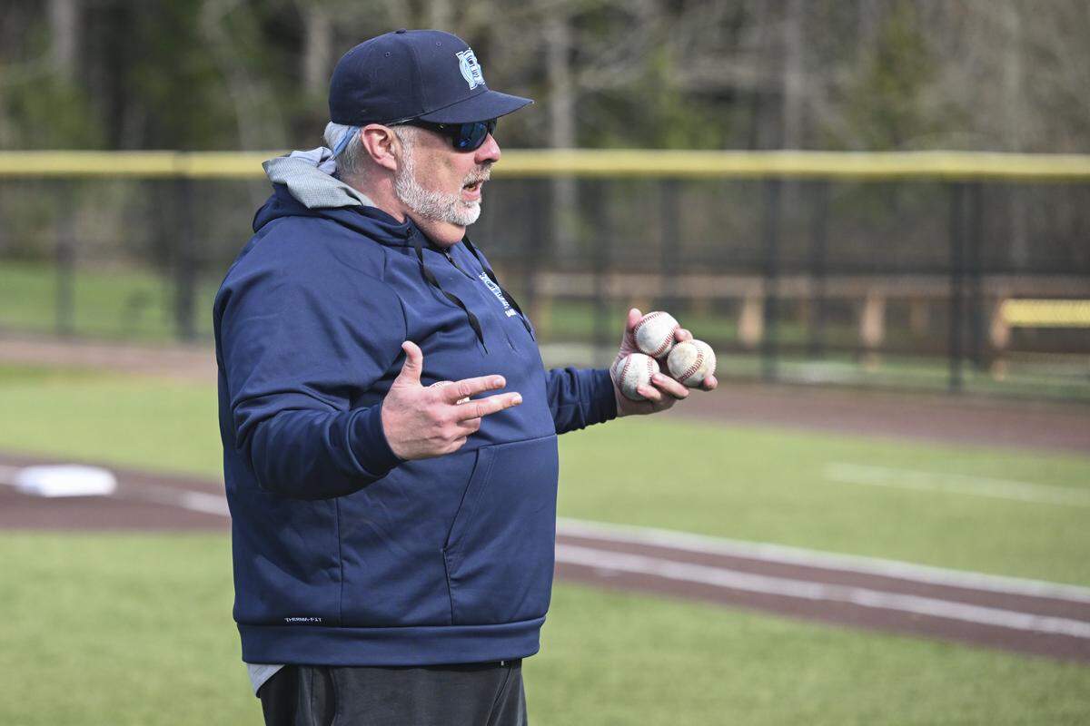 Gig Harbor head coach Ben Sleeter talks to players during practice on Monday, March 9, 2026, in Gig Harbor, Wash.