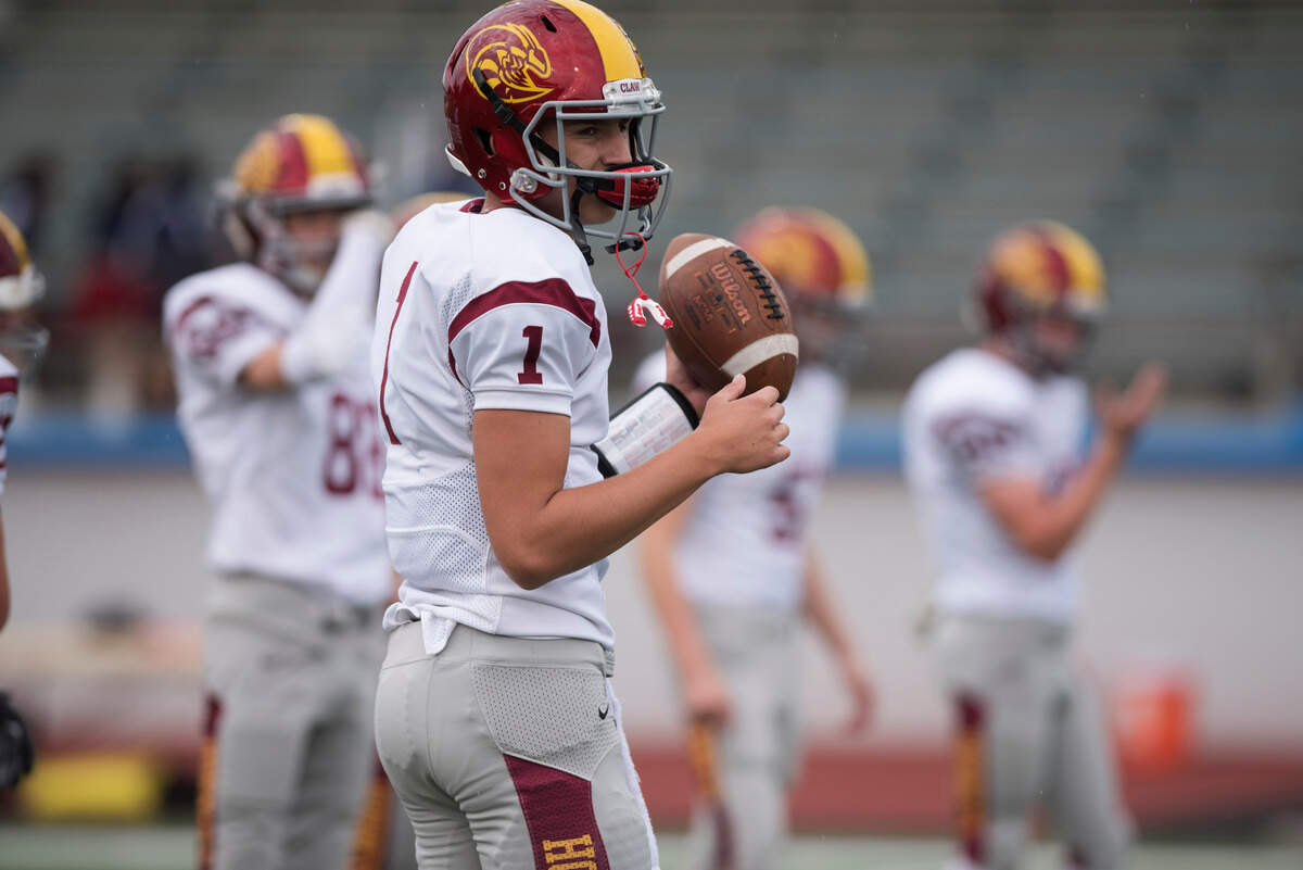 Enumclaw High School quarterback Kellen Kranc warms up before a football game against Kennedy Catholic on Saturday, Sept. 29, 2018 at Highline Memorial Stadium in Burien, Wash.