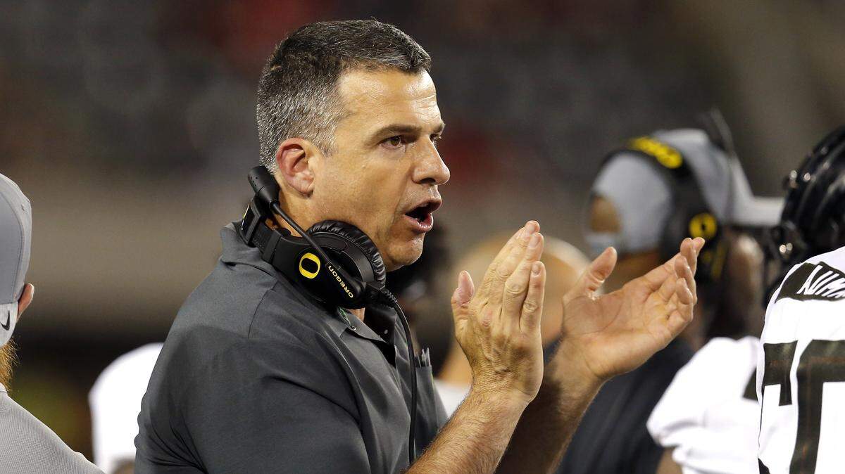 Oregon head coach Mario Cristobal supports his team in the second half during an NCAA college football game against Arizona, Saturday, Oct. 27, 2018, in Tucson, Ariz. Arizona defeated Oregon 44-15. (AP Photo/Rick Scuteri)