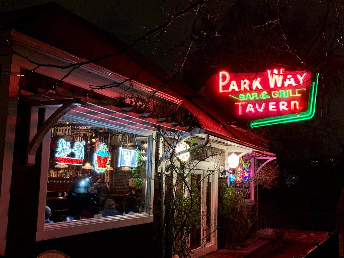 The neon sign of The Parkway in Tacoma beckons legions of fans, in normal times, for pool, shuffleboard, sandwiches, burgers and beer with friends.