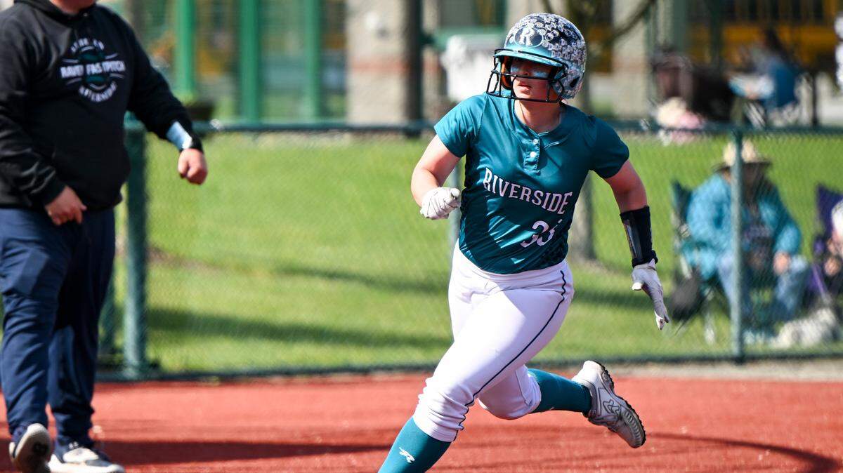 Auburn Riverside’s Lexi Vircks (33) rounds third base and heads, scoring a run against Prairie during the 3A District Championship game at the Regional Athletic Complex, on Saturday, May 18, 2024, in Olympia, Wash.