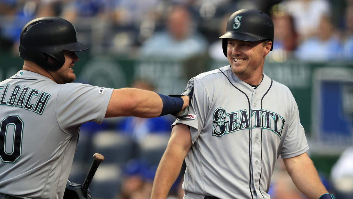 Seattle Mariners’ Jay Bruce, right, is congratulated by teammate Daniel Vogelbach, left, after his solo home run during the first inning of a baseball game against the Kansas City Royals at Kauffman Stadium in Kansas City, Mo., Tuesday, April 9, 2019. (AP Photo/Orlin Wagner)