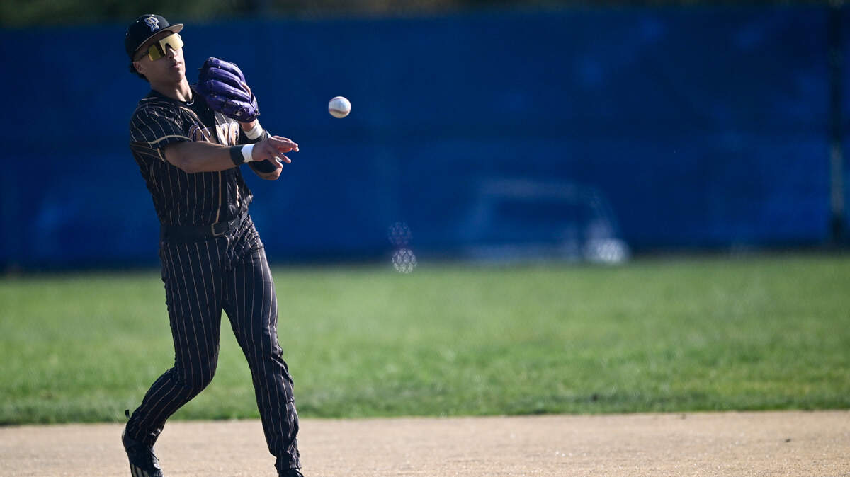 Puyallup’s Mason Pike (3) throws to first base to out a Curtis player during the baseball game at Curtis Senior High School, on Tuesday, April 15, 2025, in University Place, Wash.