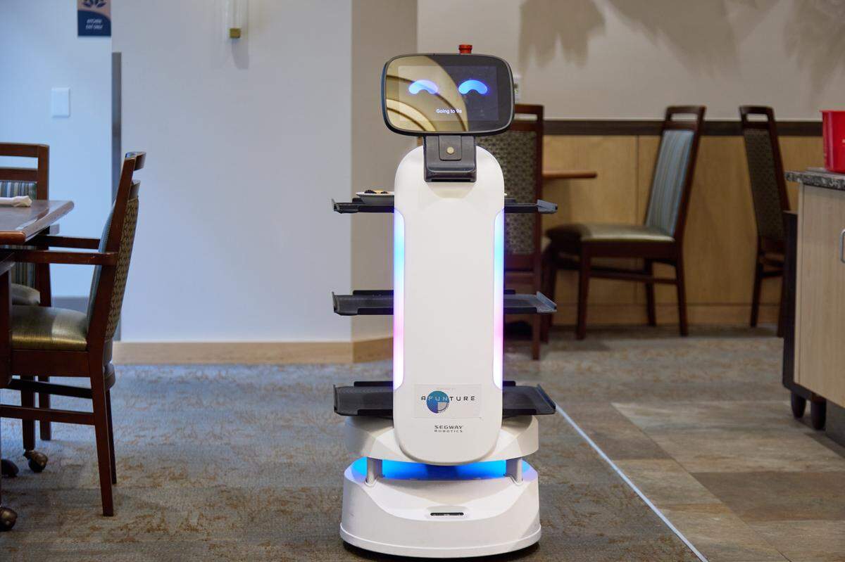 Food delivery robot “R2D2” at the GenCare Lifestyle Tacoma at Point Ruston, seen Thursday, Dec. 8, 2022. The robot offers meal delivery and can help with clearing tables and greet residents as well as sing “Happy Birthday,” among other tasks.