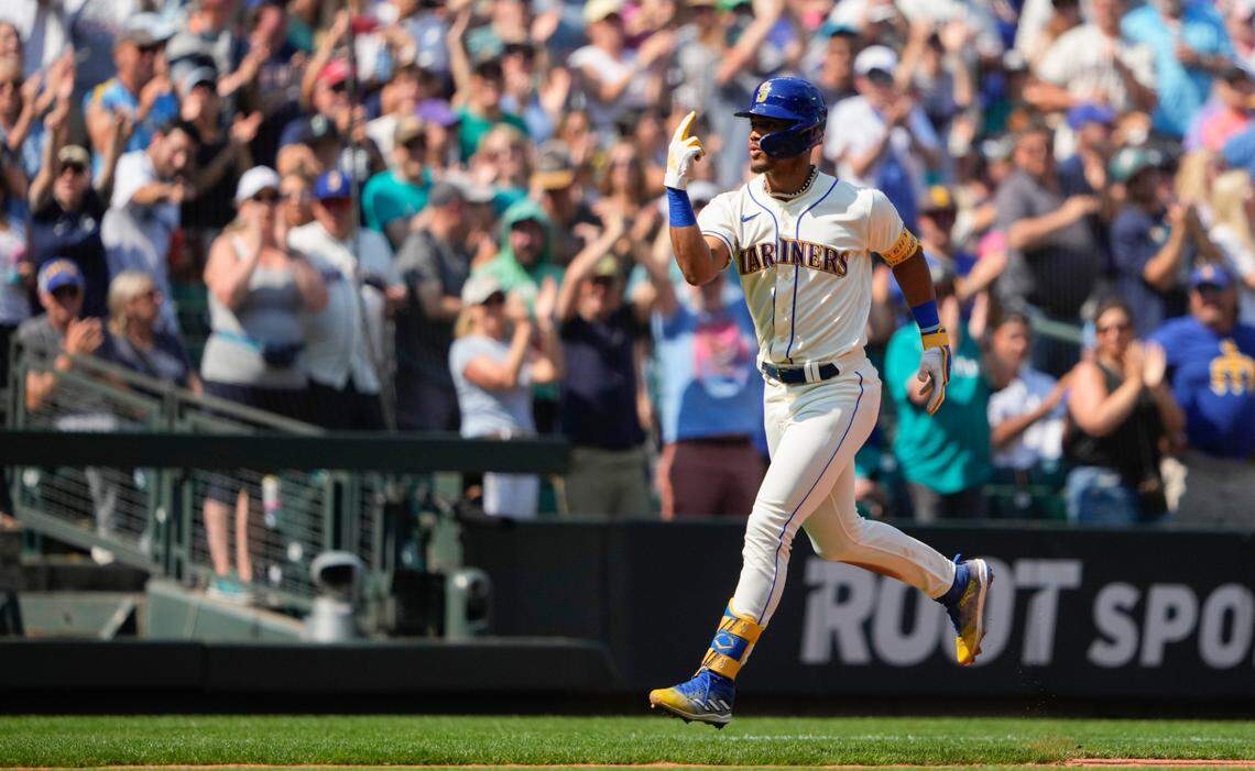 Seattle Mariners’ Julio Rodriguez jogs the bases after hitting a two-run home run to score Josh Rojas against the Kansas City Royals during the fifth inning of a baseball game, Sunday, Aug. 27, 2023, in Seattle. (AP Photo/Lindsey Wasson)