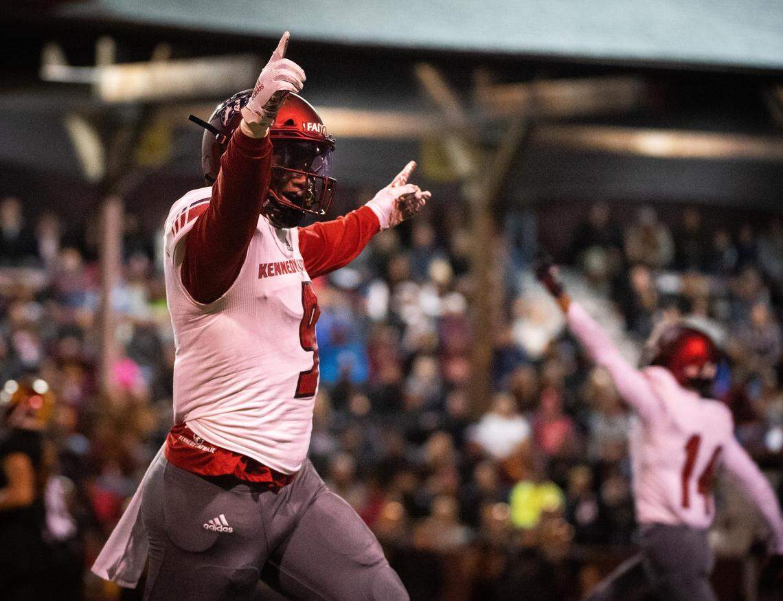 Kennedy Catholic’s Sav’ell Smalls (9) celebrates a blocked punt in the first quarter. Kennedy Catholic played Enumclaw in a football game at the Enumclaw Expo Center in Enumclaw, Wash., on Friday, Oct. 4, 2019.