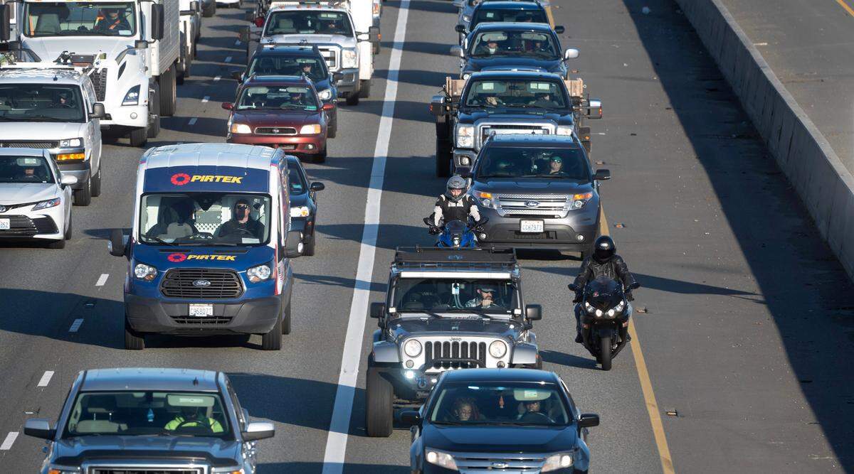 Afternoon traffic slogs south on Interstate 5 - including the HOV lane on the right - through Fife, Washington, on Tuesday, March 5, 2024. Washington State Patrol Trooper Shannon McKenzie says the number one complaint they receive from the public is about HOV lane violators.