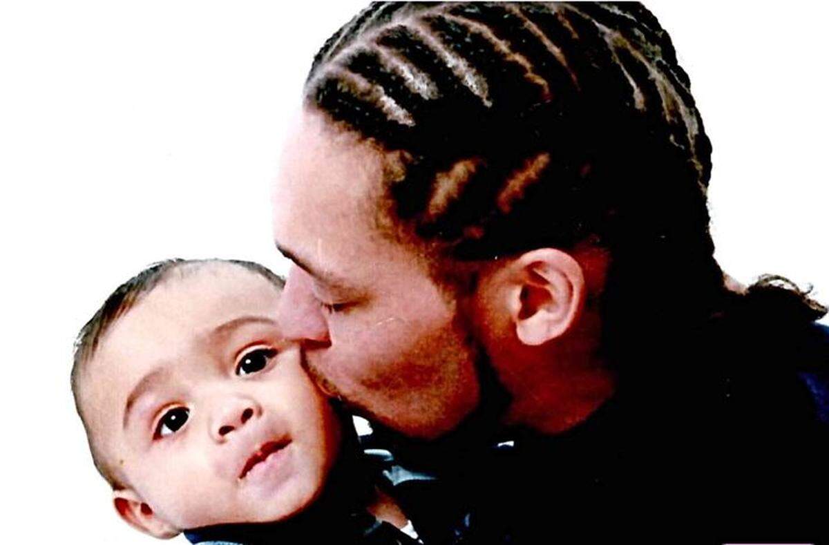 Leonard Thomas was fatally shot by a Lakewood officer May 23, 2013, after a four-hour SWAT standoff. He’s pictured here with his son, Elijah.