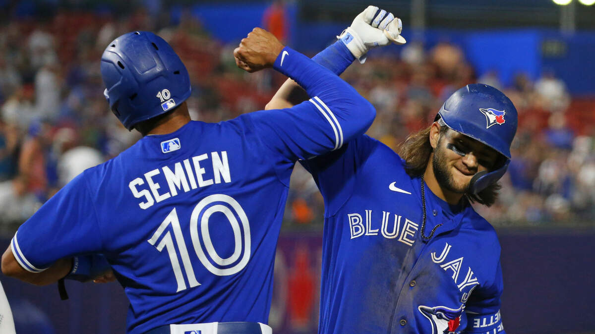 Toronto Blue Jays’ Bo Bichette,left, celebrates his three=run home run with Marcus Semien during the sixth inning of the team’s baseball game against the Seattle Mariners, Tuesday, June 29, 2021, in Buffalo, N.Y. (AP Photo/Jeffrey T. Barnes)