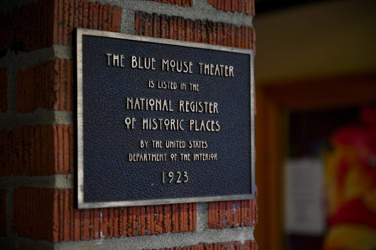 A historic plaque at the Blue Mouse Theatre, Wednesday, Nov. 1, 2023, in Tacoma. The theater turns 100 years old this month.