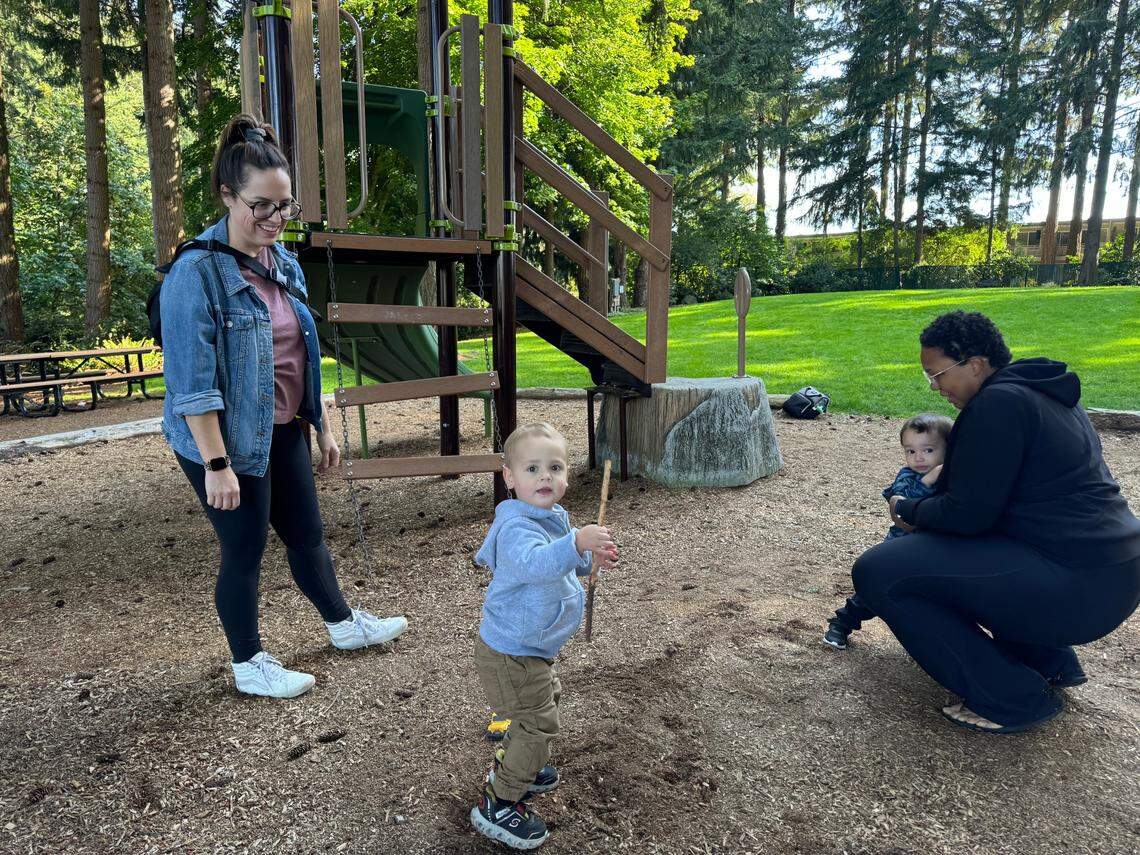 Zoey Zemanek (left) of Tacoma brought her 21-month-old son, Kieran O’Donnell, to University Place’s Homstead Park on Wednesday, Oct. 2, for a play date with 17-month-old Dean Kirkwood, accompanied by mom Teonna Kirkwood of University Place.
