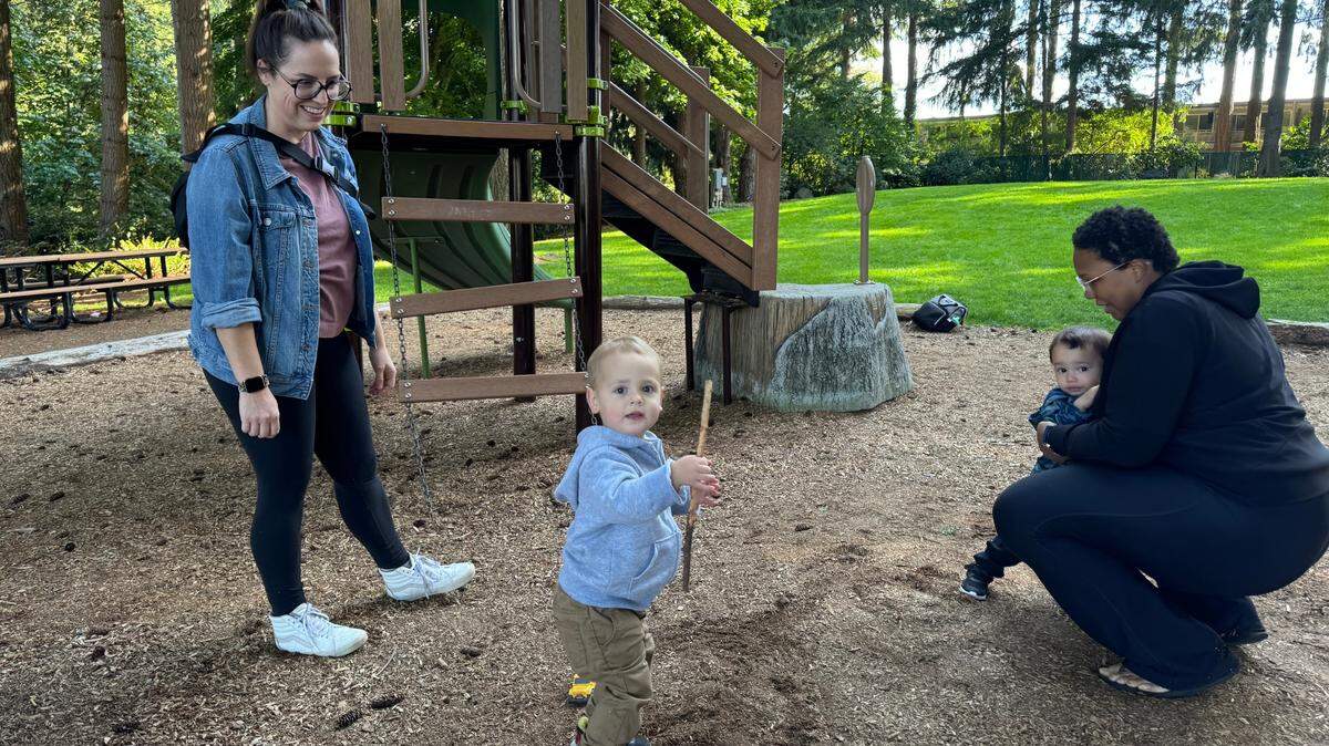 Zoey Zemanek (left) of Tacoma brought her 21-month-old son, Kieran O’Donnell to University Place’s Homstead Park on Wednesday, Oct. 2, for a play date with 17-month-old Dean Kirkwood, accompanied by mom Teonna Kirkwood of University Place.