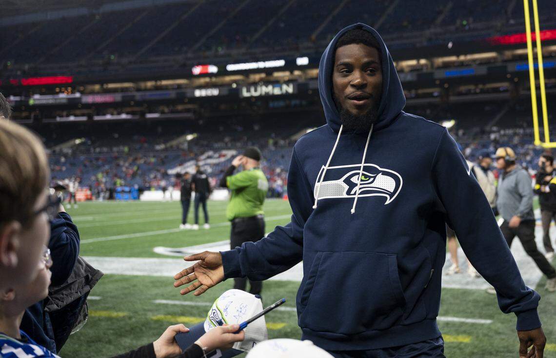 Seattle Seahawks cornerback Devon Witherspoon (21) walks back to the locker room before the game against the Houston Texans at Lumen Field, on Monday, Oct. 20, 2025, in Seattle.