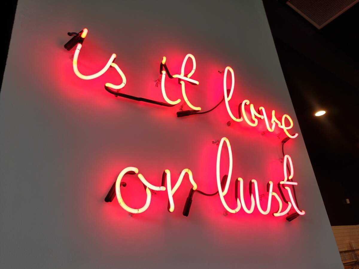 A neon sign in the dining room of Bobalust Tea House on the Foss Waterway in Tacoma.