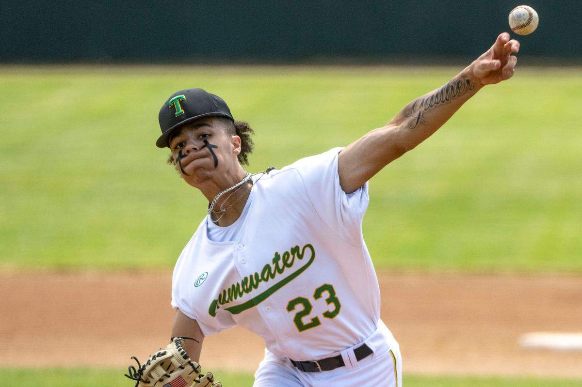 Tumwater starter Trenton Gaither delivers a pitch to Grandview’s Carlos Guillen during the first inning of a 2A State baseball opening round game at Wheeler Field in Centralia, Wash., on May 20, 2023.