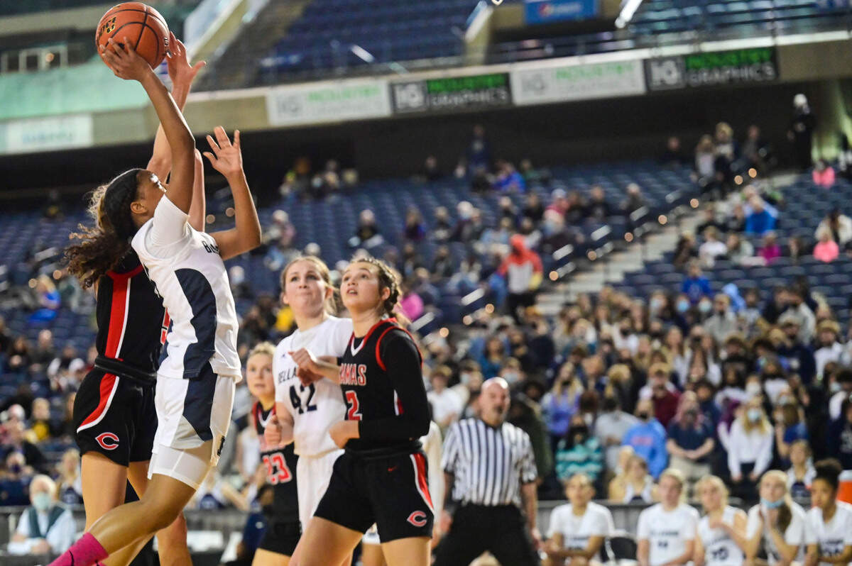Bellarmine Prep guard Kiara Stone (5) attempts a shot as Camas guard Parker Mairs (5) defends during the fourth quarter of a Class 4A state tournament game on Wednesday, March 2, 2022, at the Tacoma Dome, in Tacoma, Wash.