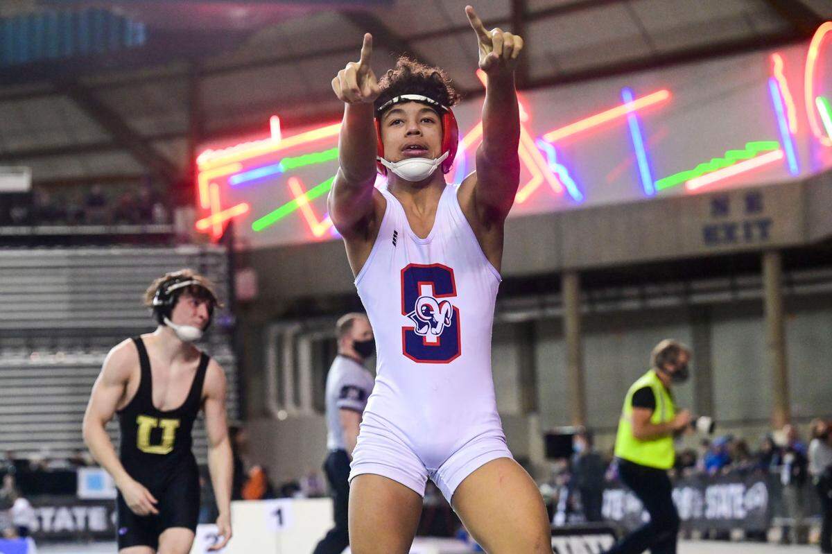 Silas’ Elijah Cater celebrates after beating University’s Tyler Walker 120-pound 3A championship match at Mat Classic XXXIII on Saturday, Feb. 19, 2022, at the Tacoma Dome in Tacoma, Wash. Cater pinned Walker in 2 minutes, 45 seconds.