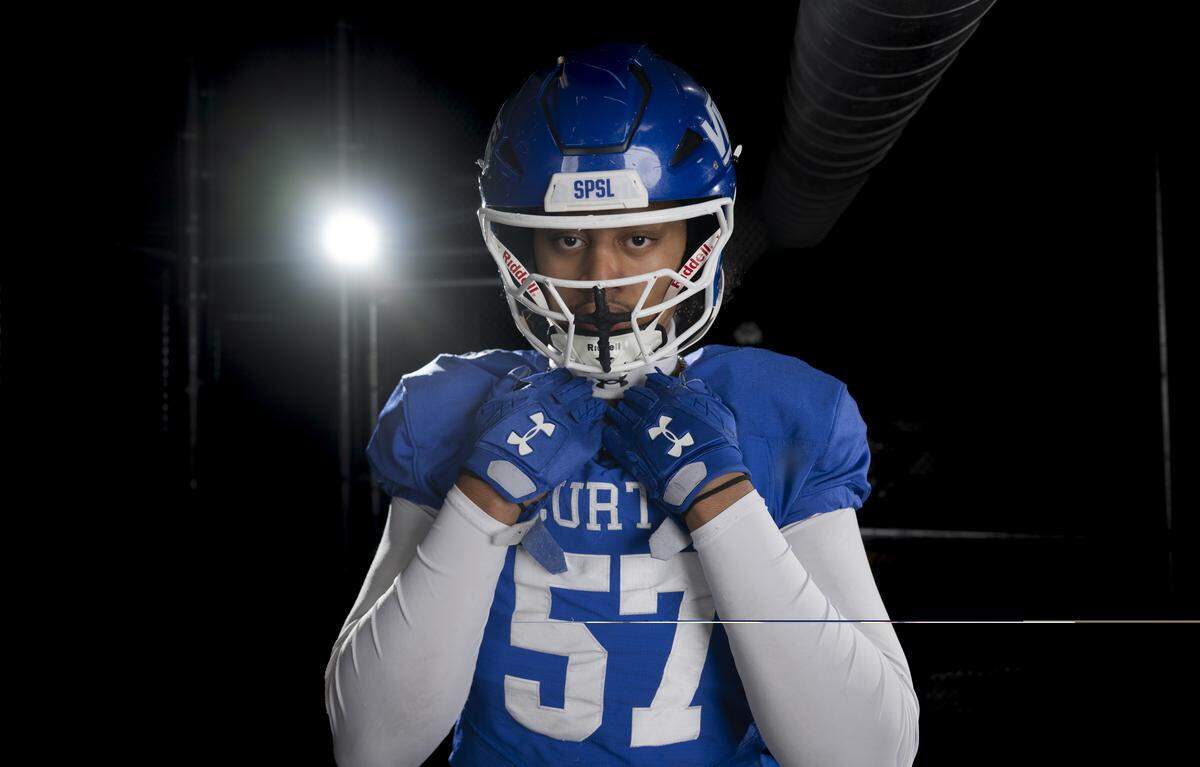 Curtis senior defensive end Robby Lavatai poses for a portrait after being selected as first-team defense for The News Tribune’s 2025 All-Area football team at Mount Tahoma High School, on Sunday, Dec. 7, 2025, in Tacoma, Wash.