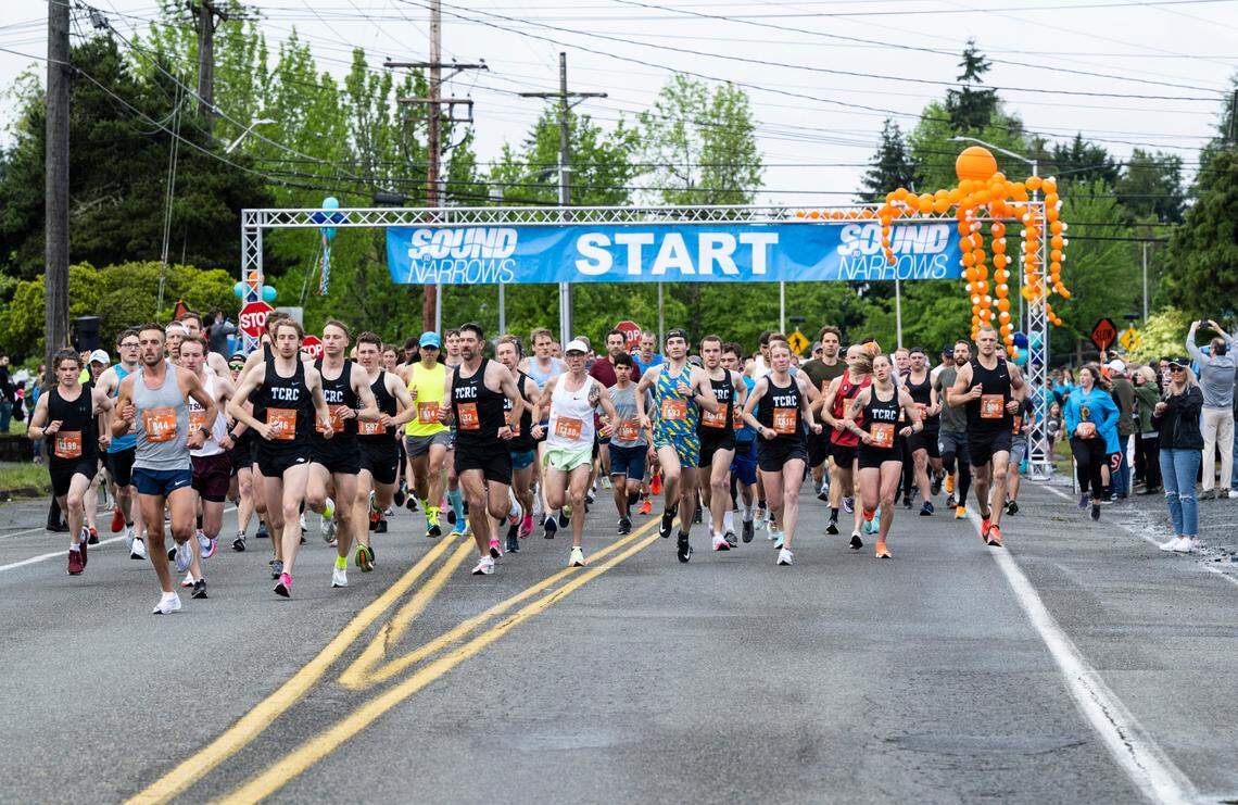 Runners take off from start line for the beginning of the 12K Sound to Narrows 50th annual run in Tacoma on June 11, 2022.