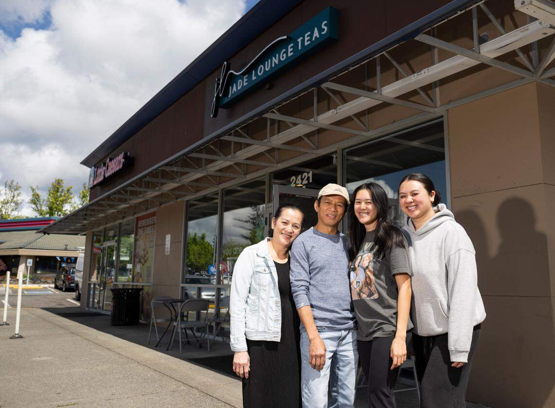 Nga and Khoa Tran (on left) helped Christina and Kelly (on right) get Jade Lounge off the ground. They’re shown outside the tea shop on Monday, April 29.