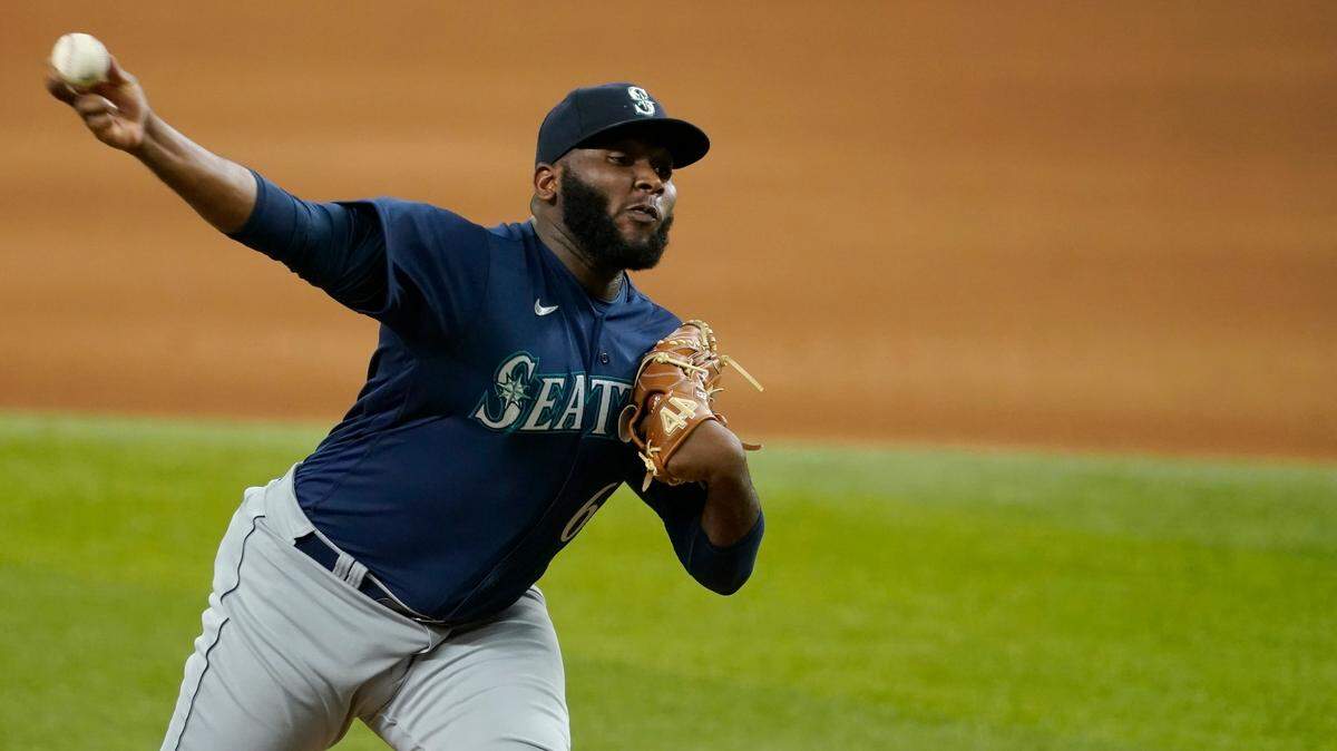 Seattle Mariners relief pitcher Diego Castillo throws to the Texas Rangers in a baseball game in Arlington, Texas, Friday, July 30, 2021. (AP Photo/Tony Gutierrez)