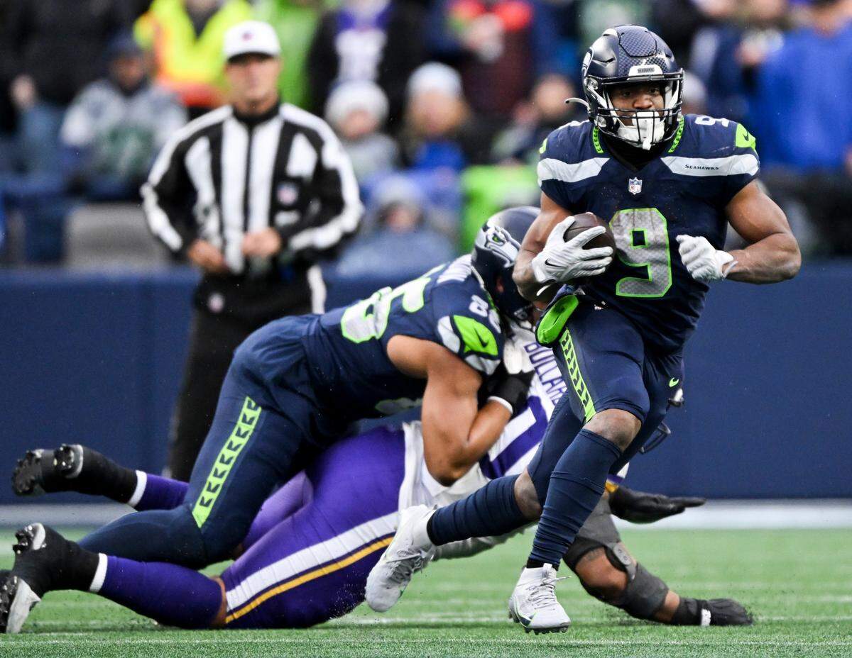 Seattle Seahawks running back Kenneth Walker III (9) carries the ball during the fourth quarter of the game against the Minnesota Vikings at Lumen Field, on Sunday, Dec. 22, 2024, in Seattle, Wash.