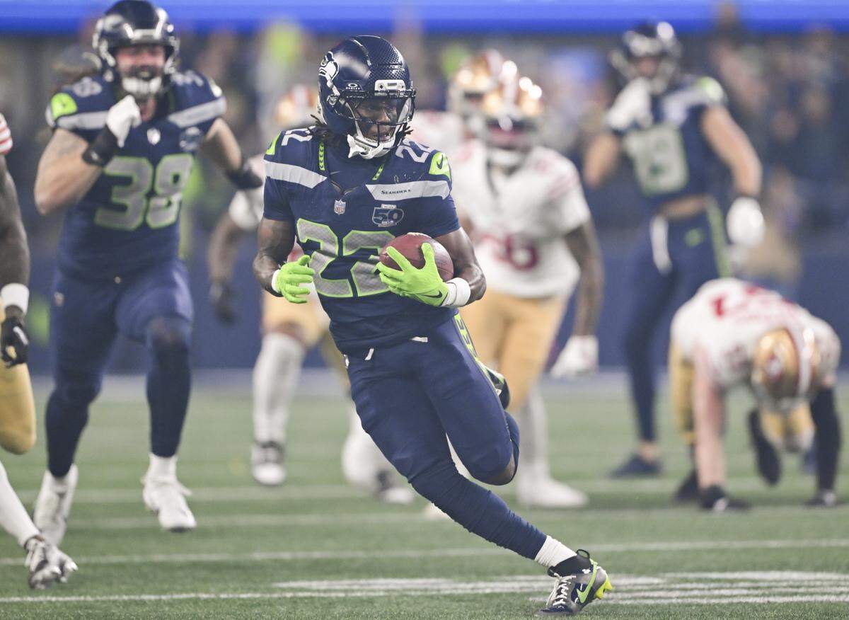 Seattle Seahawks wide receiver Rashid Shaheed (22) returns the opening kickoff for a 97-yard touchdown during the first quarter of the NFC Divisional Round game against the San Francisco 49ers at Lumen Field, on Saturday, Jan. 17, 2026, in Seattle.