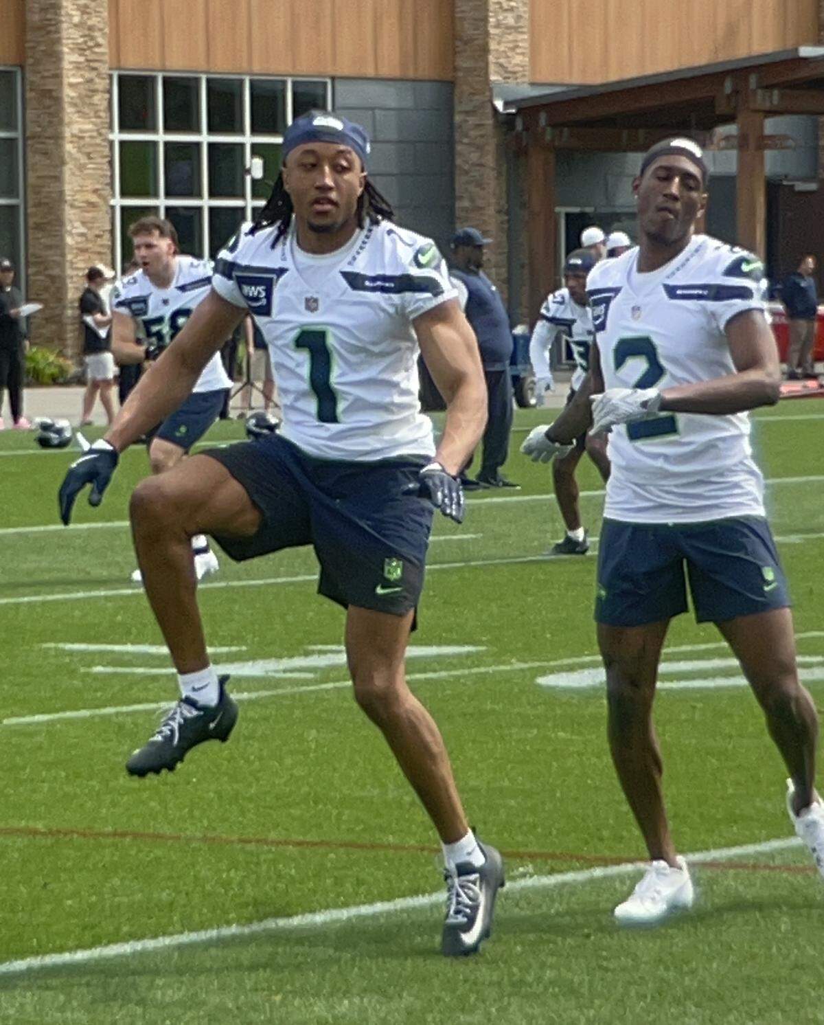 Third-round NFL draft choice Julian Neal warming up with the cornerbacks at Seattle Seahawks rookie minicamp at the Virginia Mason Athletic Center, Friday, May 1, 2026, in Renton.