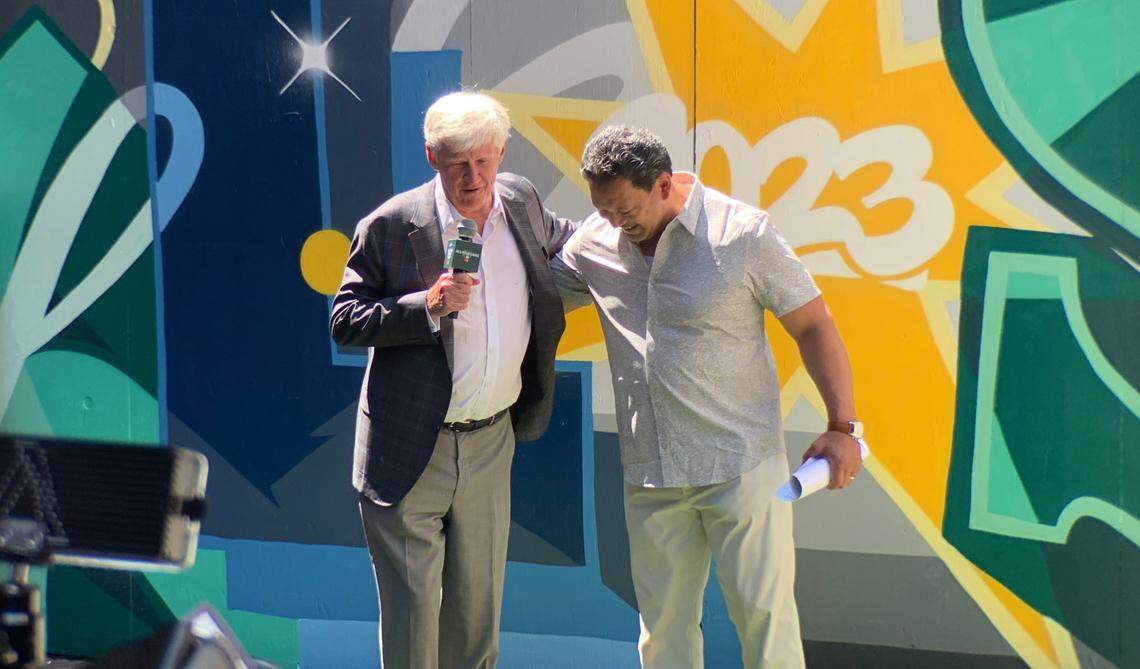 Mariners chairman and managing partner John Stanton (left) jokes with Mayor Bruce Harrell at an event July 5, 2023, previewing Seattle’s festivities for the 93rd Major League Baseball All-Star Game July 11 at T-Mobile Park.