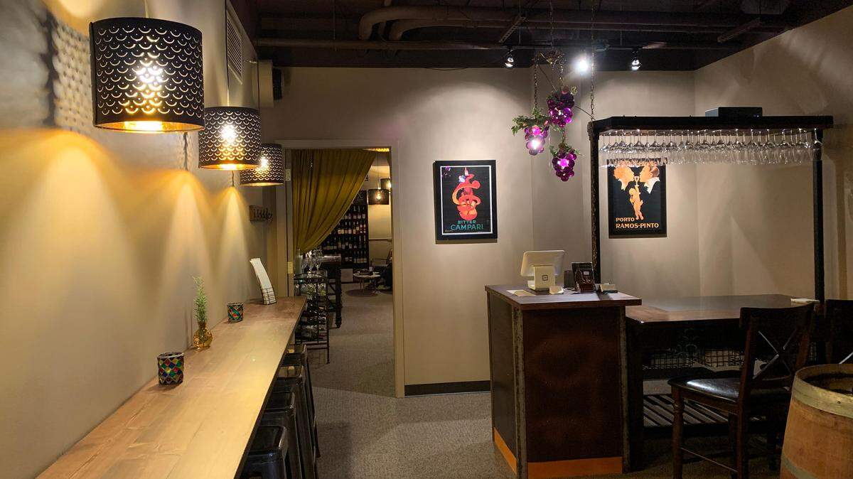 The front room at Amitie Wine Co. lets customers taste open bottles and drink a bottle from the shop on-site for a small fee, waived for wine club members.